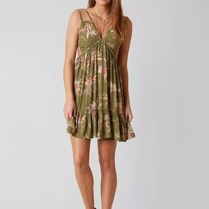 Worn once. V-neck front and back. Cut out sides. Perfect for summer!